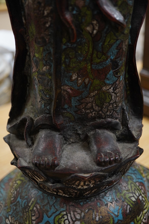 A large Chinese bronze and champleve enamel figure of a Bodhisattva, archaic style seal mark to base, 66cm